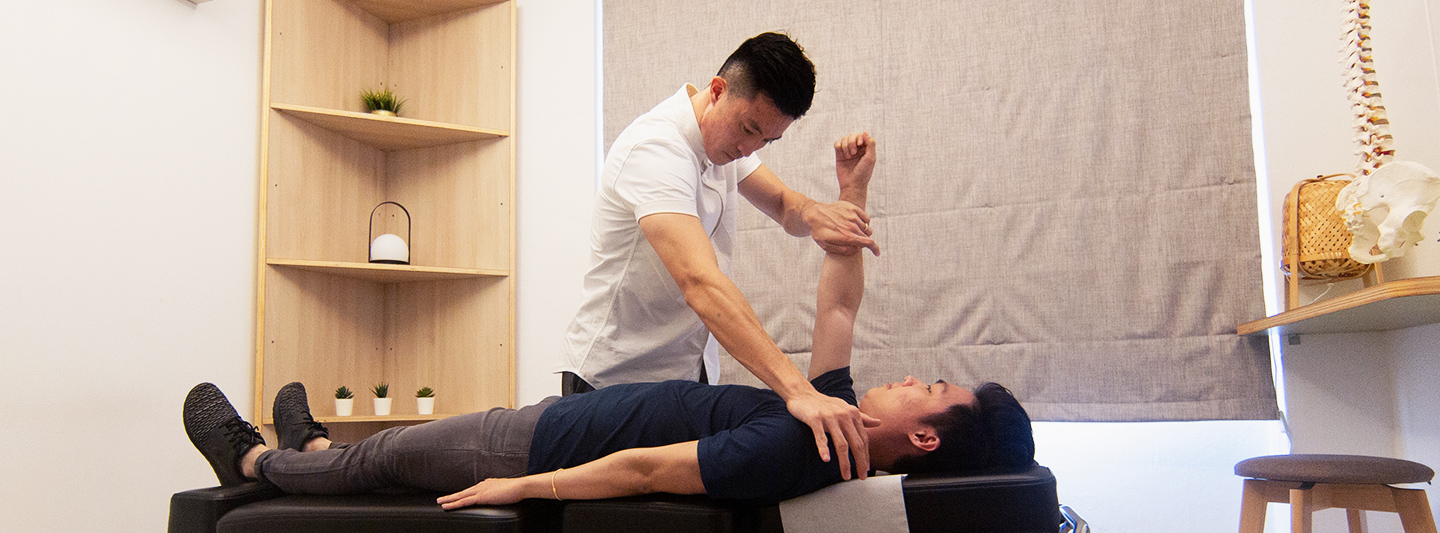 Chiropractor and patient