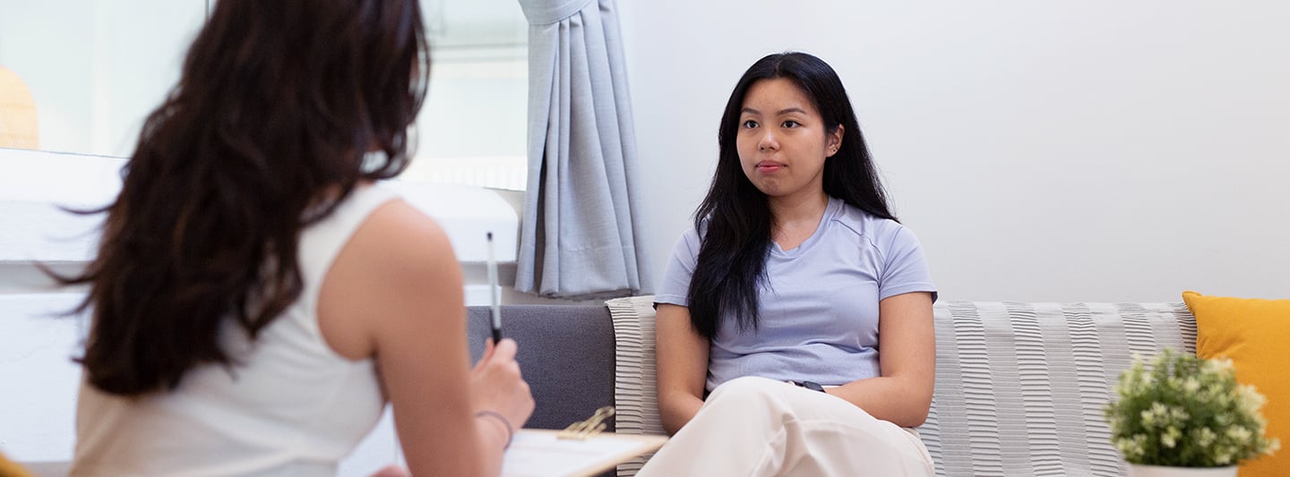 Professional Counsellor Sophia Goh counselling a patient