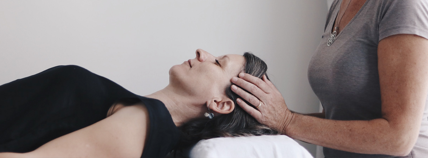 patient undergoing Reiki healing