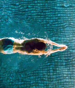 woman swimming in a pool 