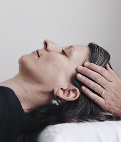 patient undergoing Reiki healing